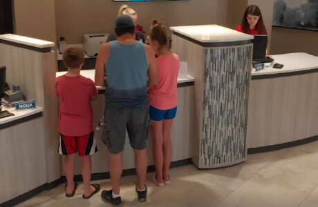 members standing in our yankee hill branch lobby