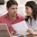 couple looking at finances