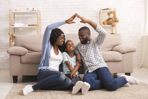 parents and child at home