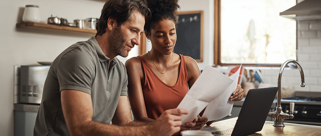 couple looking at papers